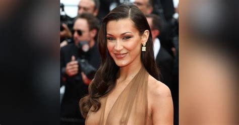 Bella Hadid Stuns In Tiny Bikini As She Takes A Dip With Her Fragrance