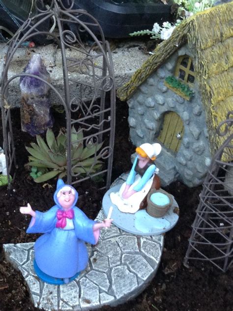 Pin by Anita Labossiere on fairy gardens | Disney garden, Fairy garden, Holiday decor