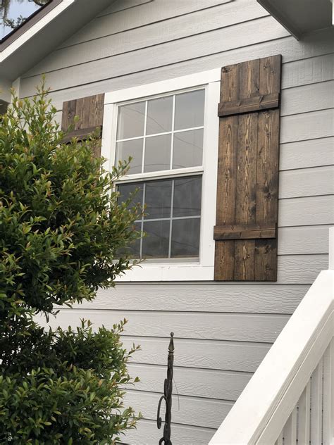 Grey Painted Brick House With Cedar Shutters Hye Field