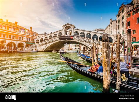 Classic View Of Traditional Gondolas On Famous Canal Grande With Famous