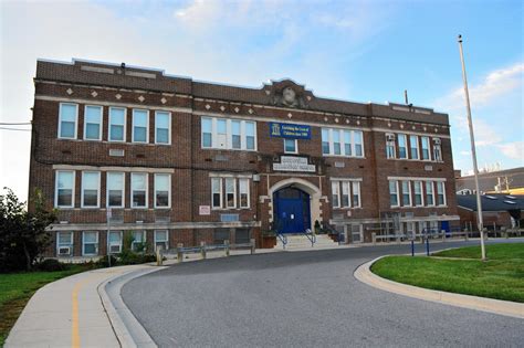 County executive sides with supporters to save old Catonsville school ...