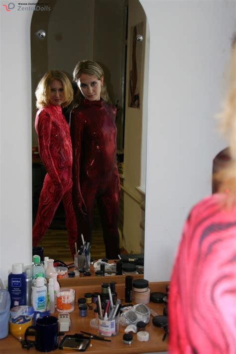 Two Horny Red Zentai Wearing Chick Exposing XXX Dessert Picture