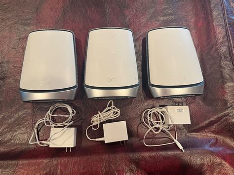 Netgear Orbi Rbr850 Wi Fi Router With Two Rbs850 Satellite Extenders