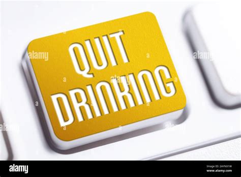 Quit Drinking Concept With An Orange Quit Drinking Button On A White