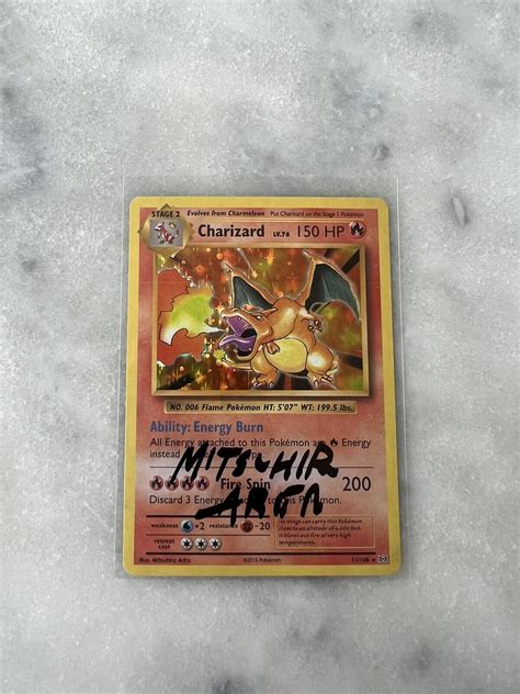 Mitsuhiro Arita Signed Charizard XY evolutions NM Pikachu Pokémon