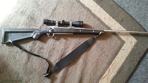 Gunlistings.org - Rifles Ruger M77 Mark II; Leupold Scope; Ammo