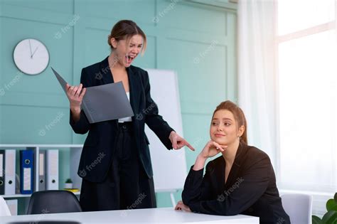 Premium Photo Boss Screaming At Frustrated Employee Bullying And