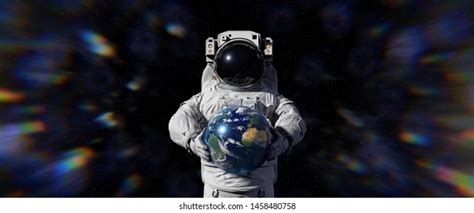 Astronaut Holding Planet Earth World Solar Stock Illustration