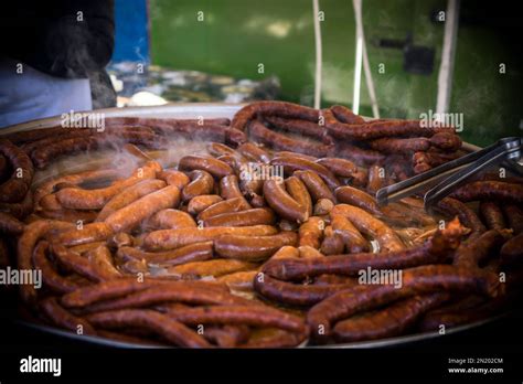 An Outdoor Food Stall Selling Grilled Homemade Sausages Stock Photo Alamy