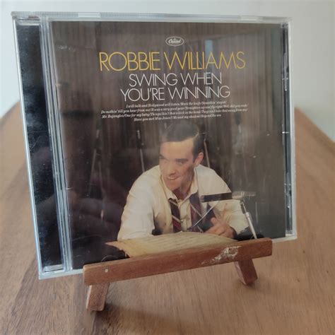 Robbie Williams - Swing When You're Winning (CD), Hobbies & Toys, Music ...