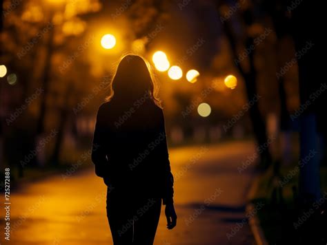 Woman walking alone at night. Fear of stalkers, crime, and other bad ...