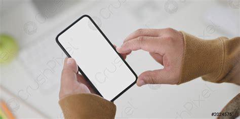 Close Up View Of Man Hand Holding Blank Screen Smartphone Stock Photo