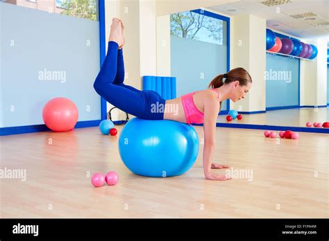 Pilates Woman Fitball Rocking Exercise Workout At Gym Indoor Stock