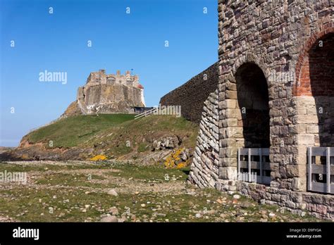 Buildings On Holy Island And Lindisfarne Castle Hi Res Stock