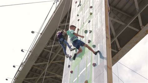 Kids Climbing Rock Wall While Climbing Competition Stock Video Video