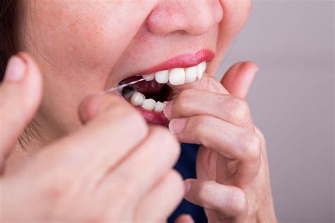 How To Floss Your Teeth A Beginners Guide