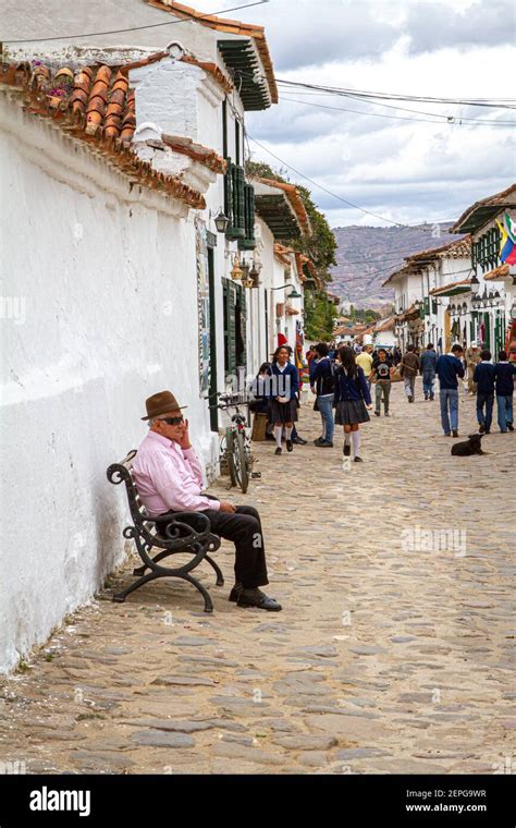 people, wearing poncho. Artisan sellers,tourism. Villa de Leyva 500 ...