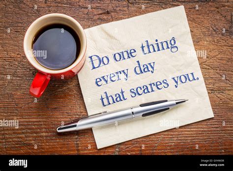 Do one thing every day that scares you - motivational handwriting on a ...
