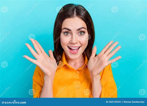 Photo Of Impressed Funny Lady Wear Orange Shirt Smiling Rising Arms