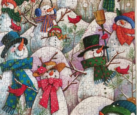 A Jigsaw Puzzle With Snowmen And Birds On It