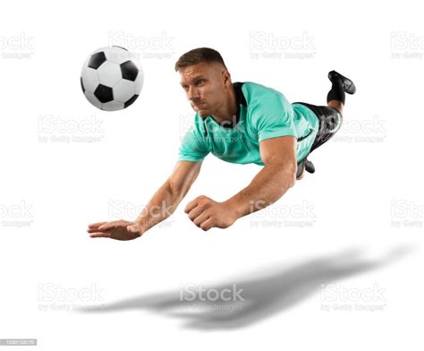 Soccer Player Jumping For A Header The Isolated On White Stock Photo