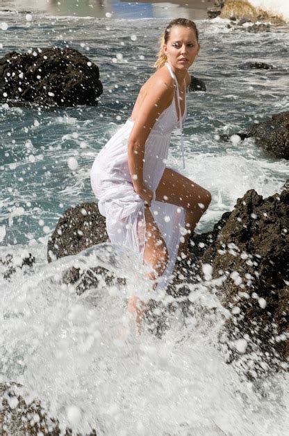 Premium Photo Attractive Blonde Model In A Fishing Village By The Sea