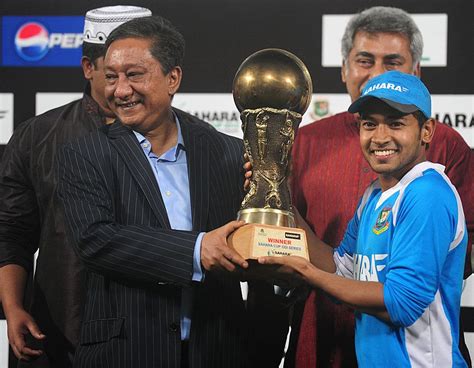 Mushfiqur Rahim holds the trophy after winning the series ...