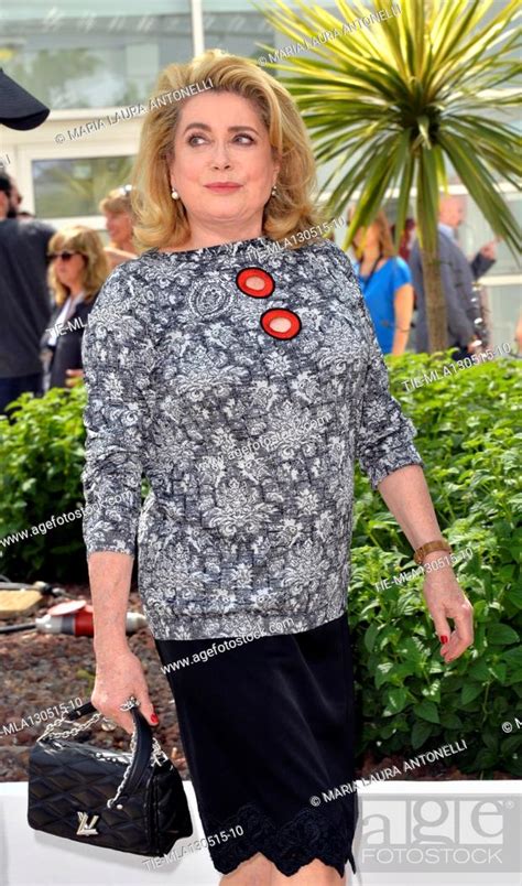 Catherine Deneuve During The Photocall Of Film La Tete Haute Cannes