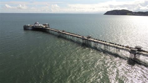 aerial view historic victorian llandudno pier Stock Footage Video (100% ...