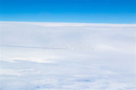 Flying Airplane in the Clouds Editorial Photo - Image of cloud ...