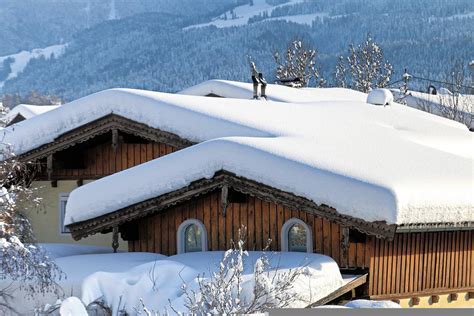 How Snow And Ice Can Impact Your Roof Adam Construction