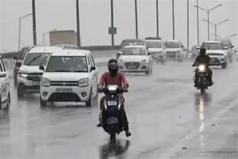 Rainfall In Delhi Brings Relief From Heat For Residents