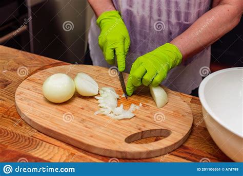 Close Up View Of Female Hands Peeling Onions Stock Image Image Of