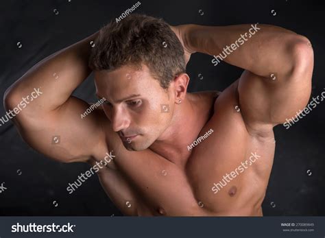 Handsome Shirtless Bodybuilder Shot Above Standing Stock Photo