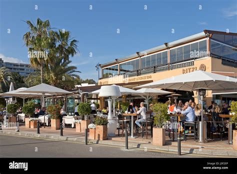 restaurant at the marina in Portals Nous, Mallorca, Spain Stock Photo - Alamy