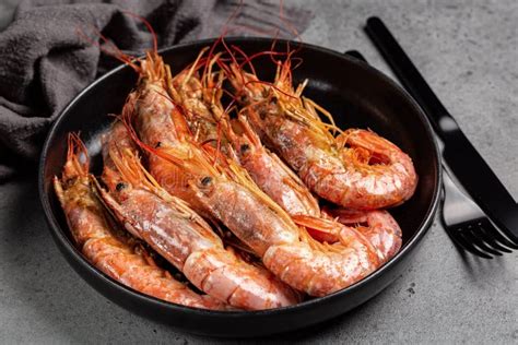 Giant Argentinian Red Prawns Grilled Black Plate With Cooked Seafood