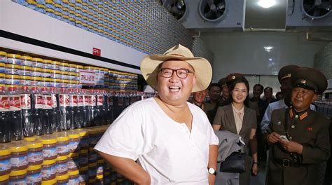 North Korea leader Kim Jong Un swaps Mao-style suit for summer clothes