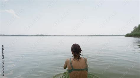 Sexy Summer Relaxing Of Bikini Woman Diving Into The Water In Lake During Summer Holidays