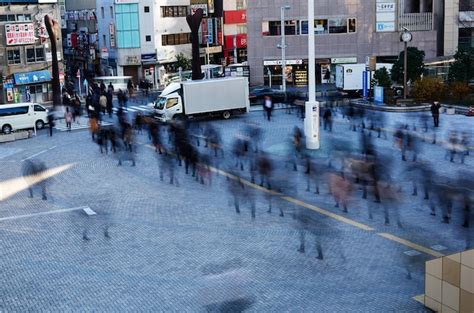 Premium Photo High Angle View Of People Walking On Road