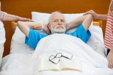 Senior Man In Hospital Bed Stock Photo By Andreybezuglov