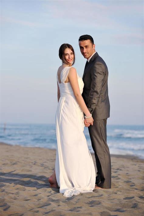 romantic beach wedding at sunset 12648158 Stock Photo at Vecteezy