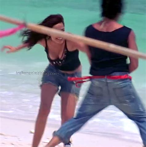 Neha Sharma Ram Charan Chirutha Hot Cleavage Hd Caps Starcelebblog