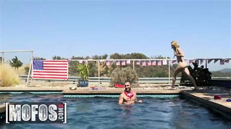 Strips Down And Flashes Her Tits In A Pool Party