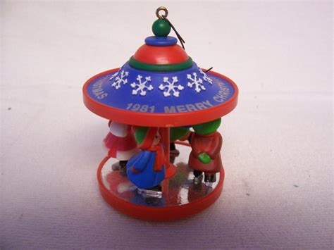 Hallmark Carousel Ornament Vintage Christmas Skaters Merry