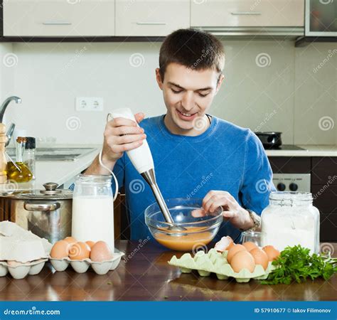 Guy Cooking Omelet With Flour Stock Photo | CartoonDealer.com #63517938