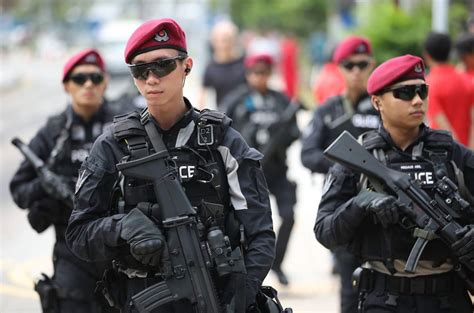 Troopers From Singapores Special Operations Command Providing Security