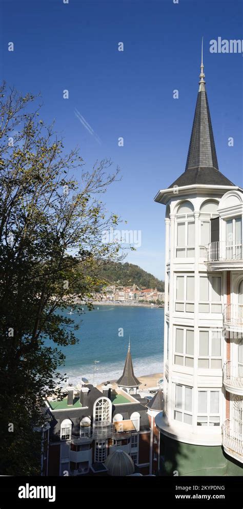 La Concha beach in San Sebastian between houses Stock Photo - Alamy