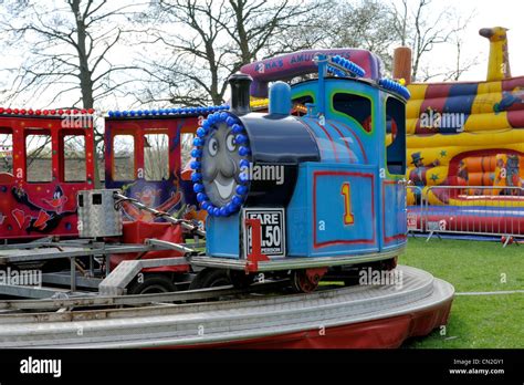 Thomas the Tank fun face amusement train ride Stock Photo - Alamy