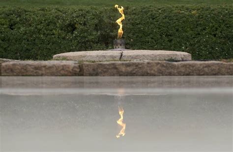 Permanent eternal flame relit on John F. Kennedy's grave - UPI.com