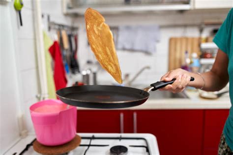 Flipping Pancakes Stock Photos Pictures And Royalty Free Images Istock